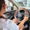 imageFuzzy Steering Wheel Cover for Women Girls Accmor Universal Fit 15 inch Fur Car Wheel Cover amp Handbrake Cover amp Gear Shift Cover Set Fashion Leopard Winter Warm Fluffy Vehicle Wheel ProtectorBeigeLeopard